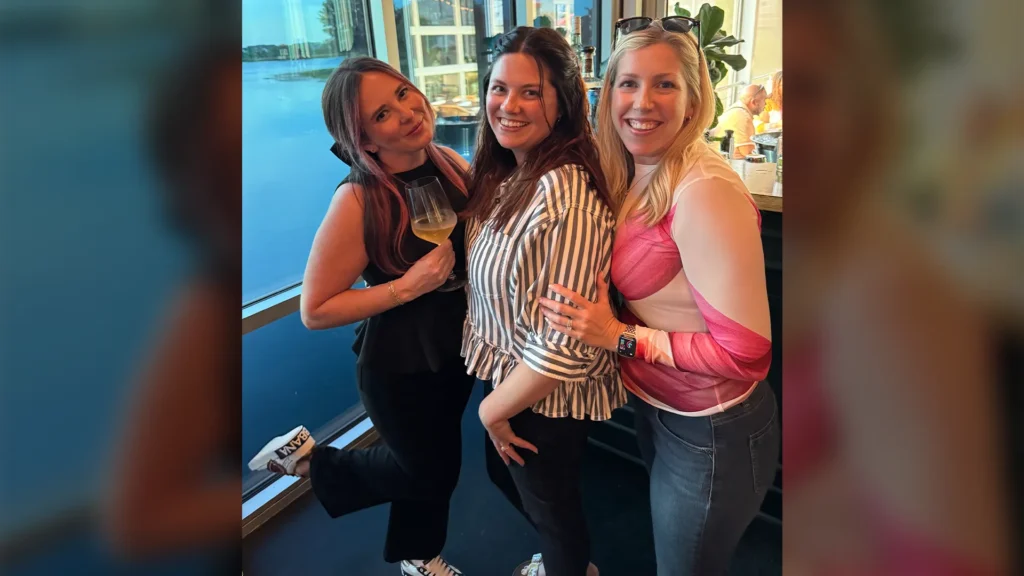 Three attendees and speakers at the Jumpstart Orlando AV live events conference posing together.