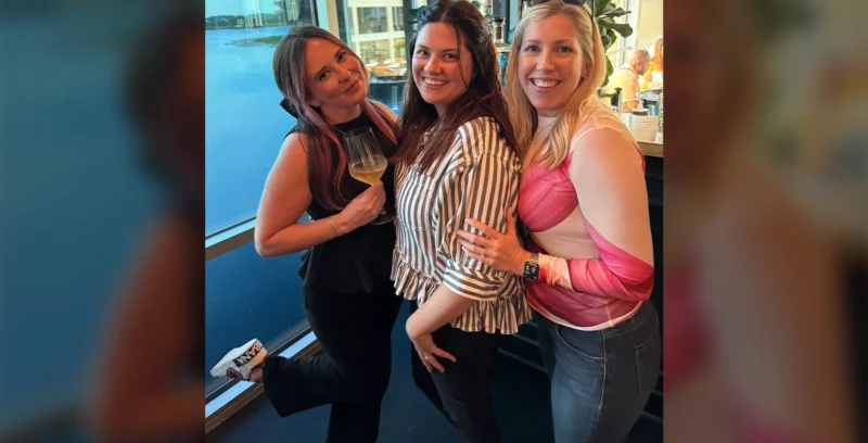 Three attendees and speakers at the Jumpstart Orlando AV live events conference posing together.
